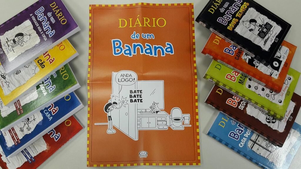 Coleção de livros da série "Diário de um Banana" dispostos em uma mesa, exibindo capas coloridas e ilustrações características, representando o universo divertido e cativante criado por Jeff Kinney.